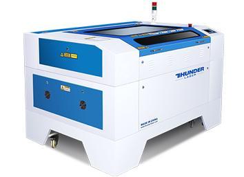 nova 35 laser by thunder laser canada. blue and white metal machine