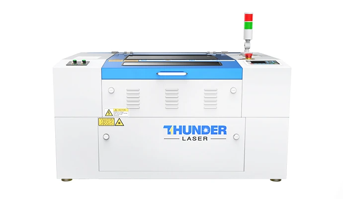 A blue an white laser cutter machine called the Nova 24 l