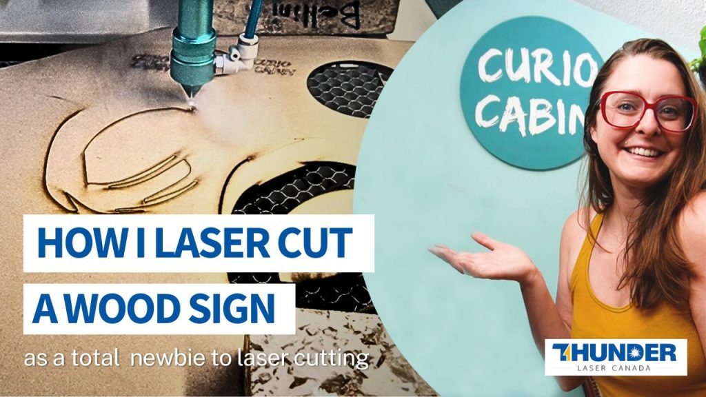 cover for youtube video: a light skinned woman with brown hair red glasses and a yellow tank top stands smiling infront of a wood sign that says Curio Cabin. On the right is an image of a laser cutter and title that says how I laser cut a wood sign