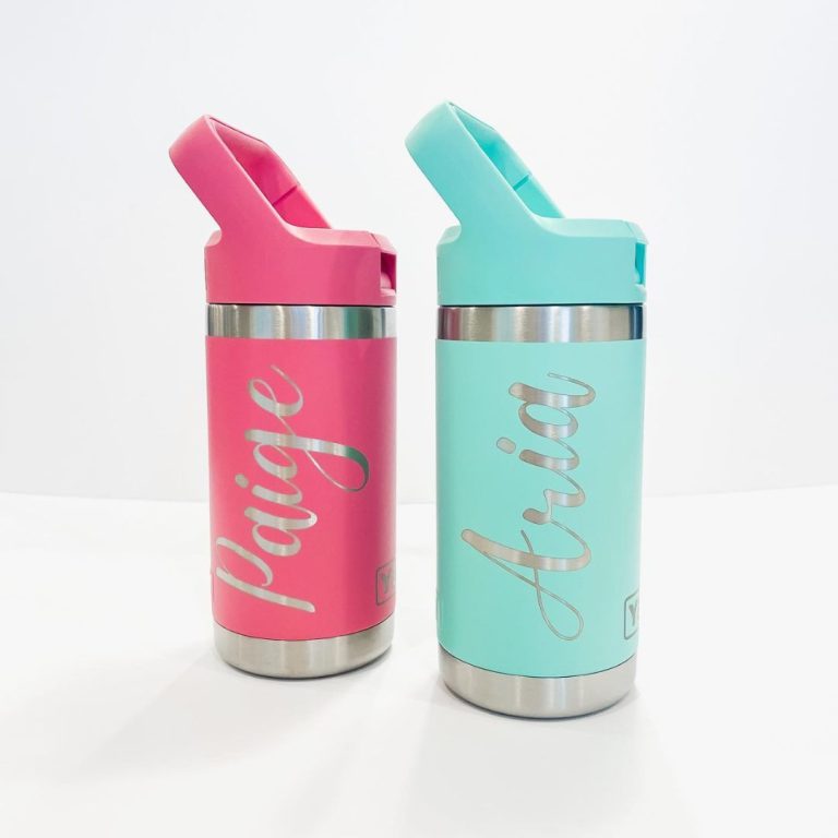 2 laser engraved childrens mugs with drinking straws and a handle built in. Left: pink with Paige engraved and right teal with Aria engraved
