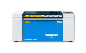 front view of the thunder Bolt laser cutter machine. It is blue and white metal Thunder Laser Canada
