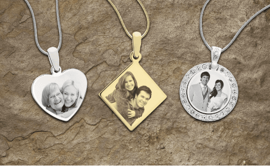 3 laser engraved metal pendants on necklace chains. There are photos laser engraved on each pendant. The first and last pendant of the 3 are silver. the middle is gold.