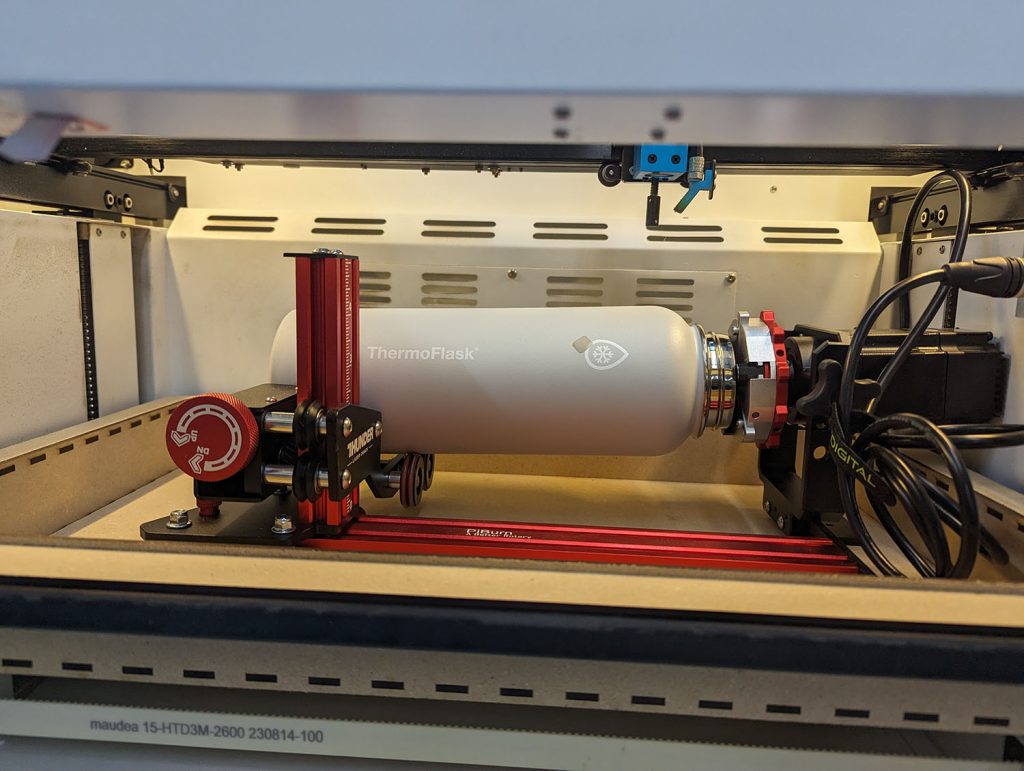 image of the thunder bolt with the piburn rotary for thunderbolt inside the laser bed.