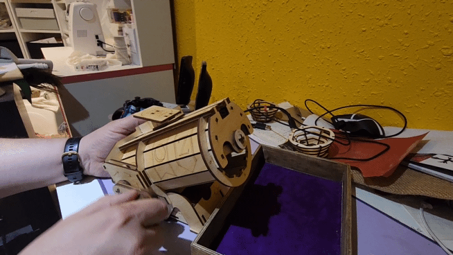 mechanical dice tower made of wood on a laser cutter by Austin Hager