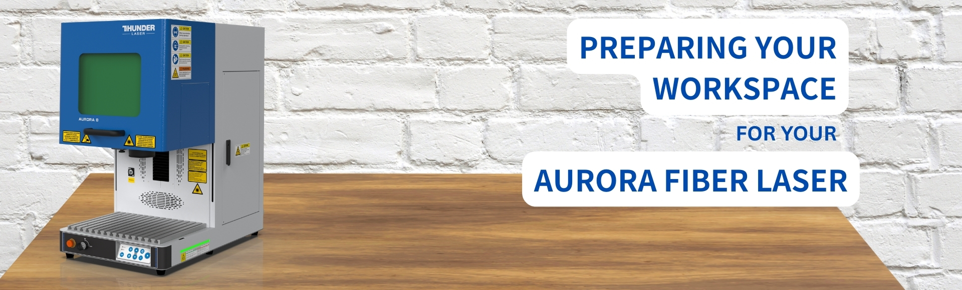 aurora thunder laser on a table in a garage banner says preparing your workspace for your Aurora Fiber Laser