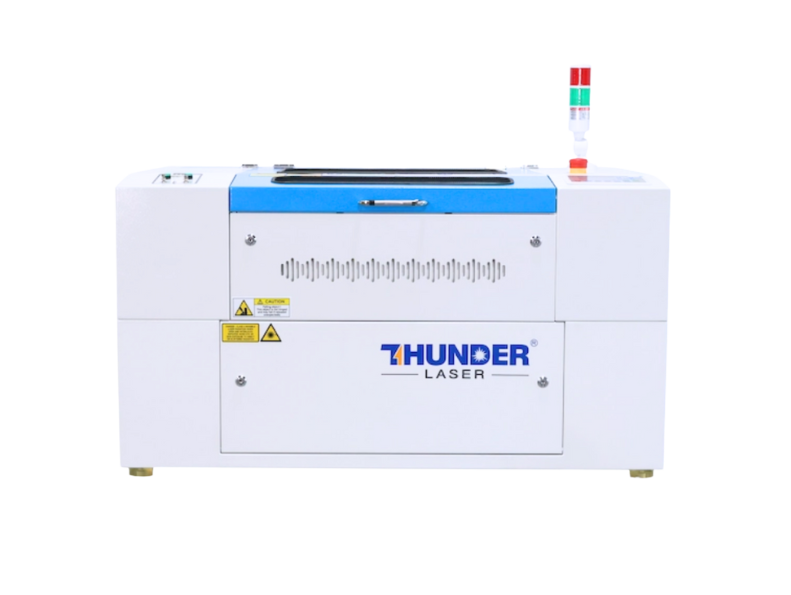 a white and blue metal Thunder Laser machine Nova Plus with an RF tube