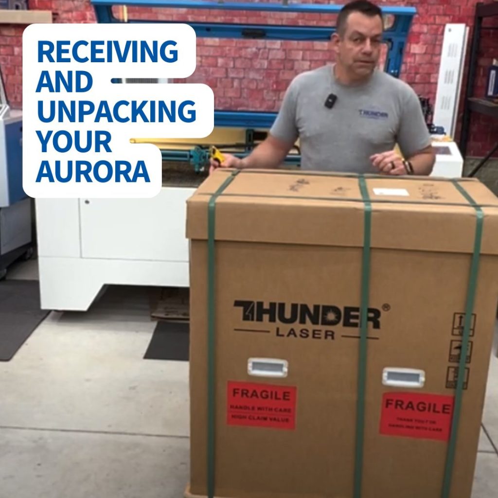 man with thunder laser aurora in cardboard crate with thunder laser logo