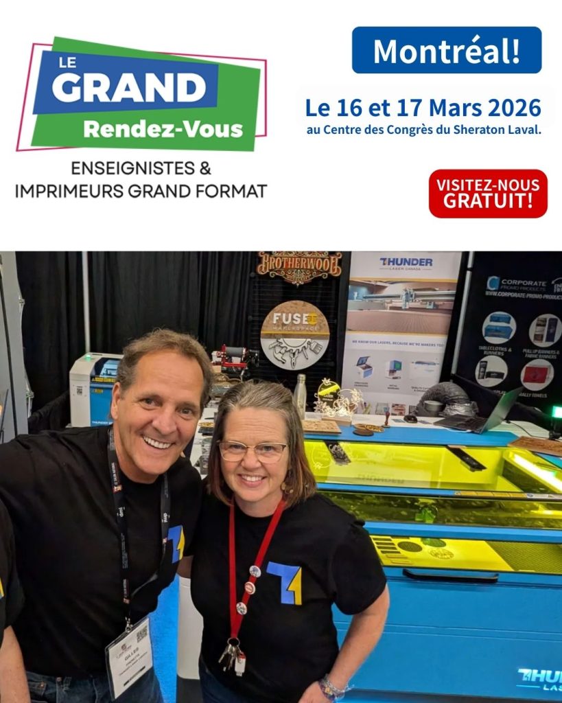 Man Gilles (sales Montreal) and woman Katy (Demo center Montreal) stand at a trade show with a Thunder Laser Machine